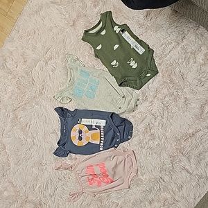 Lot of 4 Okie Dokie baby girl  graphic onesies.  NEWBORN